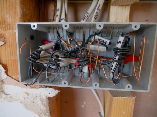 Electrician upgrading an electrical panel at a Texas property
